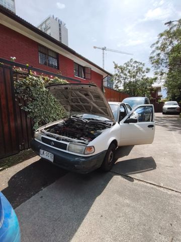 Nissan Sentra 1997 – no encendía por distribución saltada – electromecánico a domicilio en Santiago